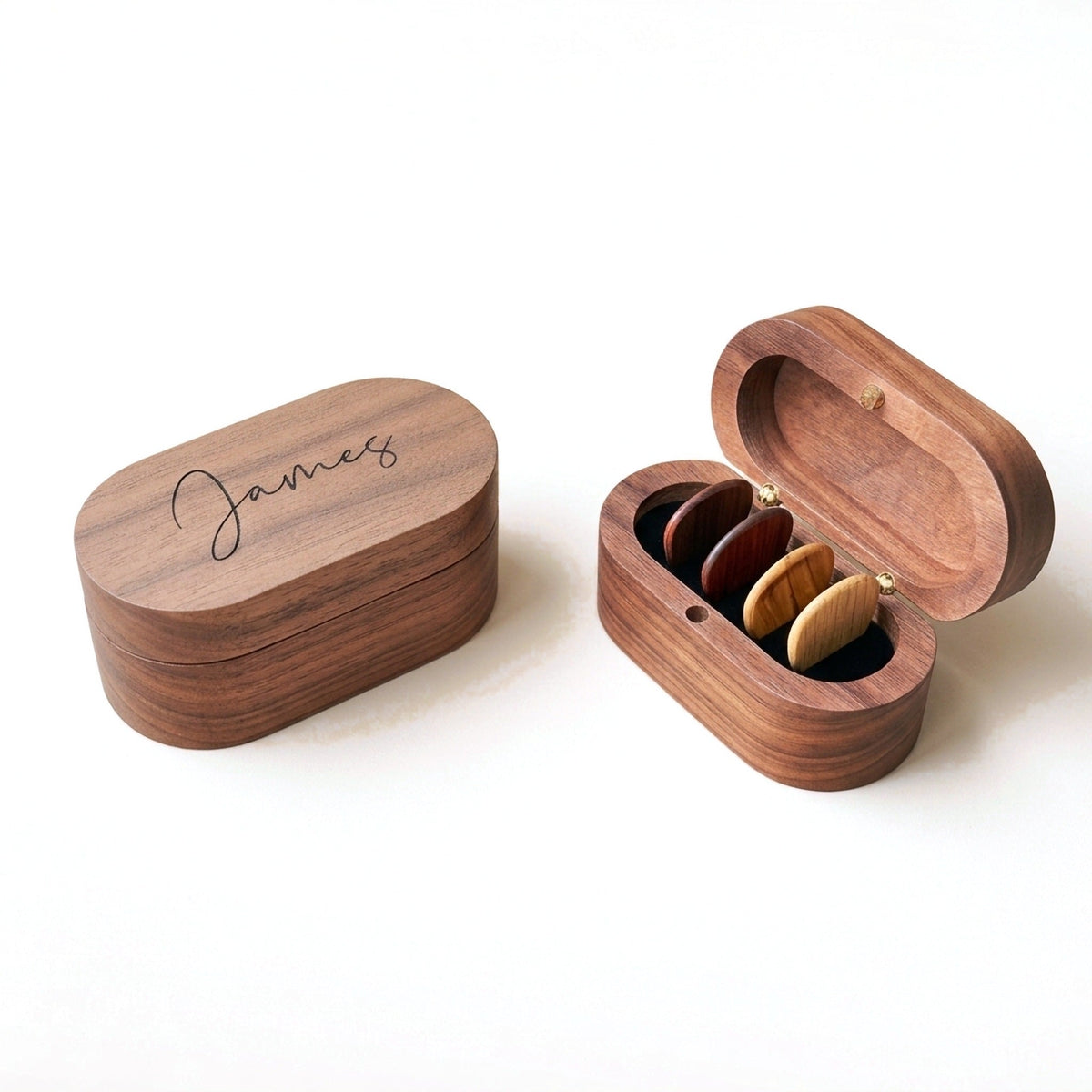 Oval walnut guitar pick box shown closed and open with picks inside